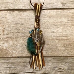Western suede with feathers tassel